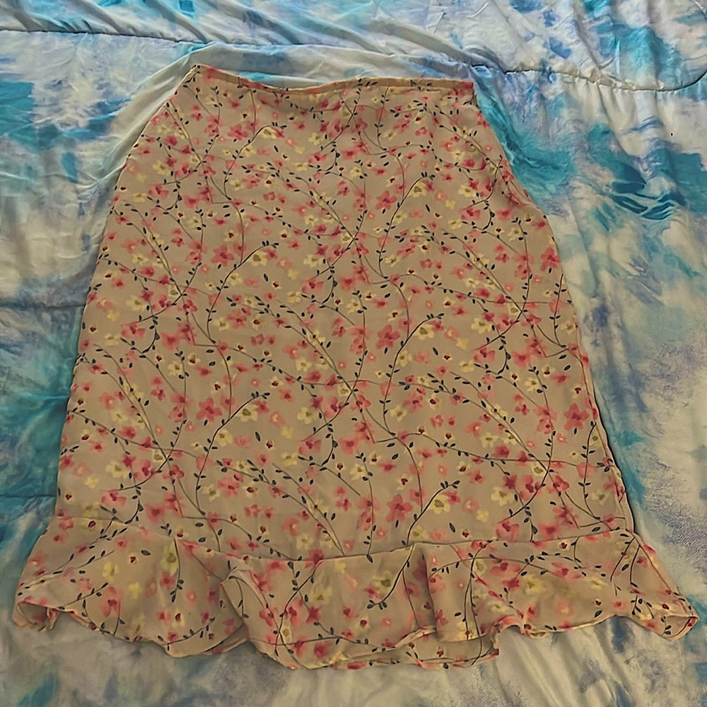 A skirt with flowers that give off a spring vibe.